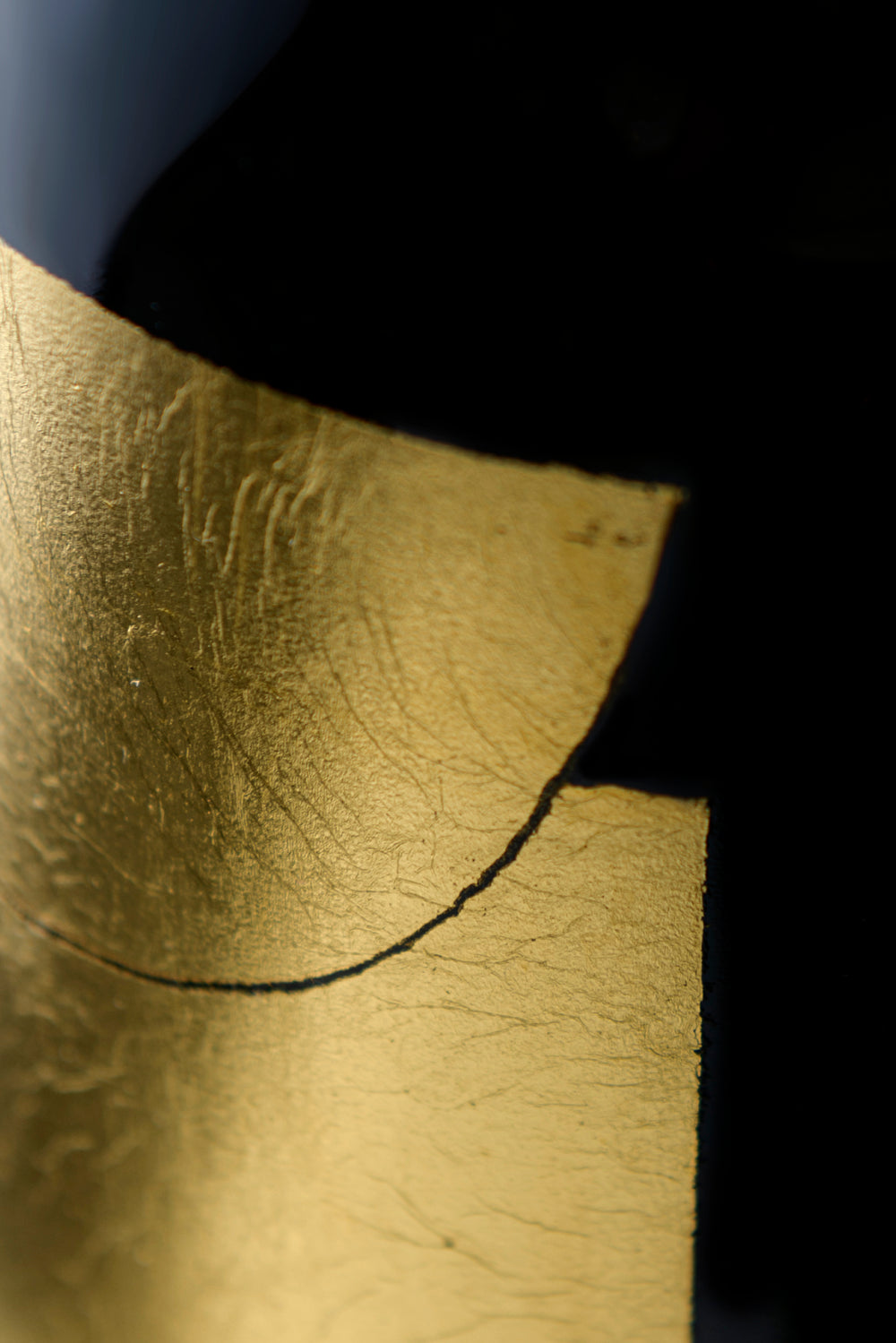 Wine bottle craft detail and amber reflections